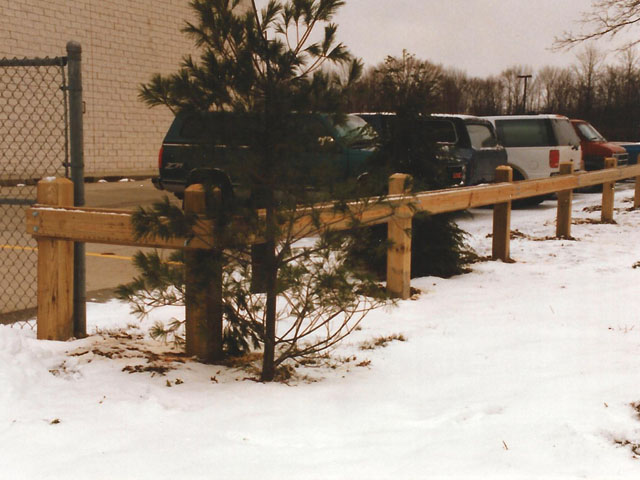Commercial Wooden Guard Rail Fence for Parking Lot by Elyria Fence